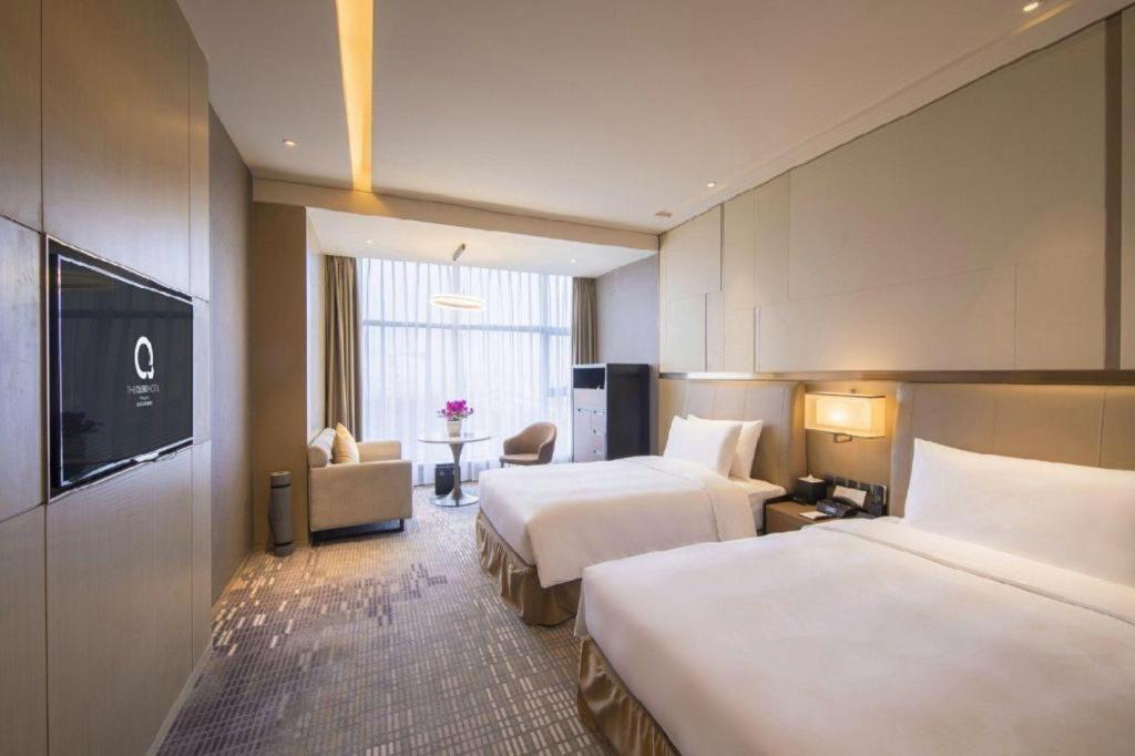 שיאנגיאנג The Qube Hotel Xiangyang מראה חיצוני תמונה