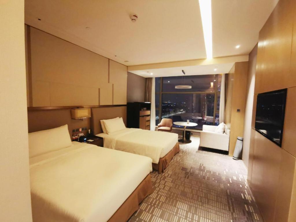 שיאנגיאנג The Qube Hotel Xiangyang מראה חיצוני תמונה