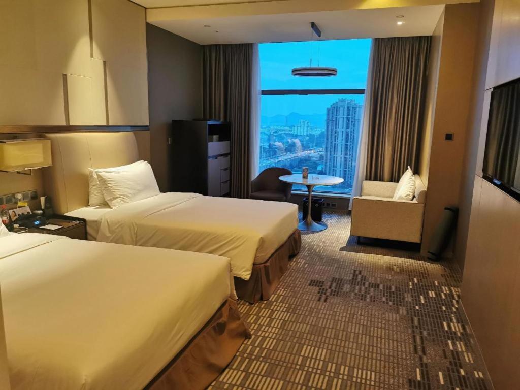 שיאנגיאנג The Qube Hotel Xiangyang מראה חיצוני תמונה