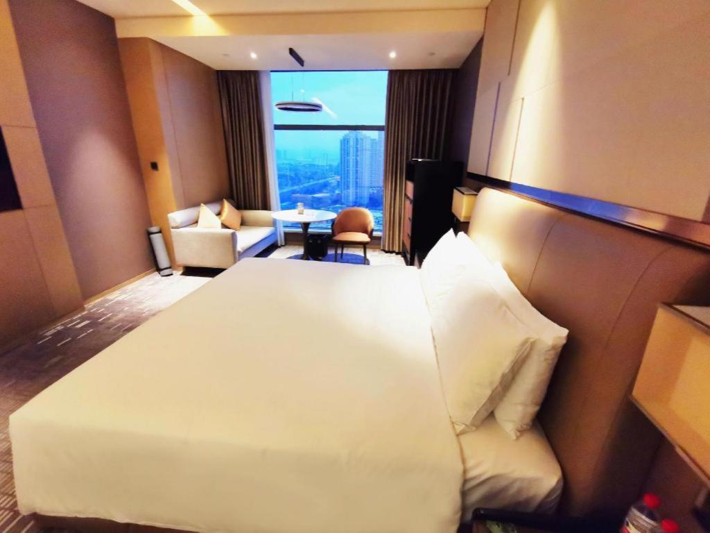שיאנגיאנג The Qube Hotel Xiangyang מראה חיצוני תמונה